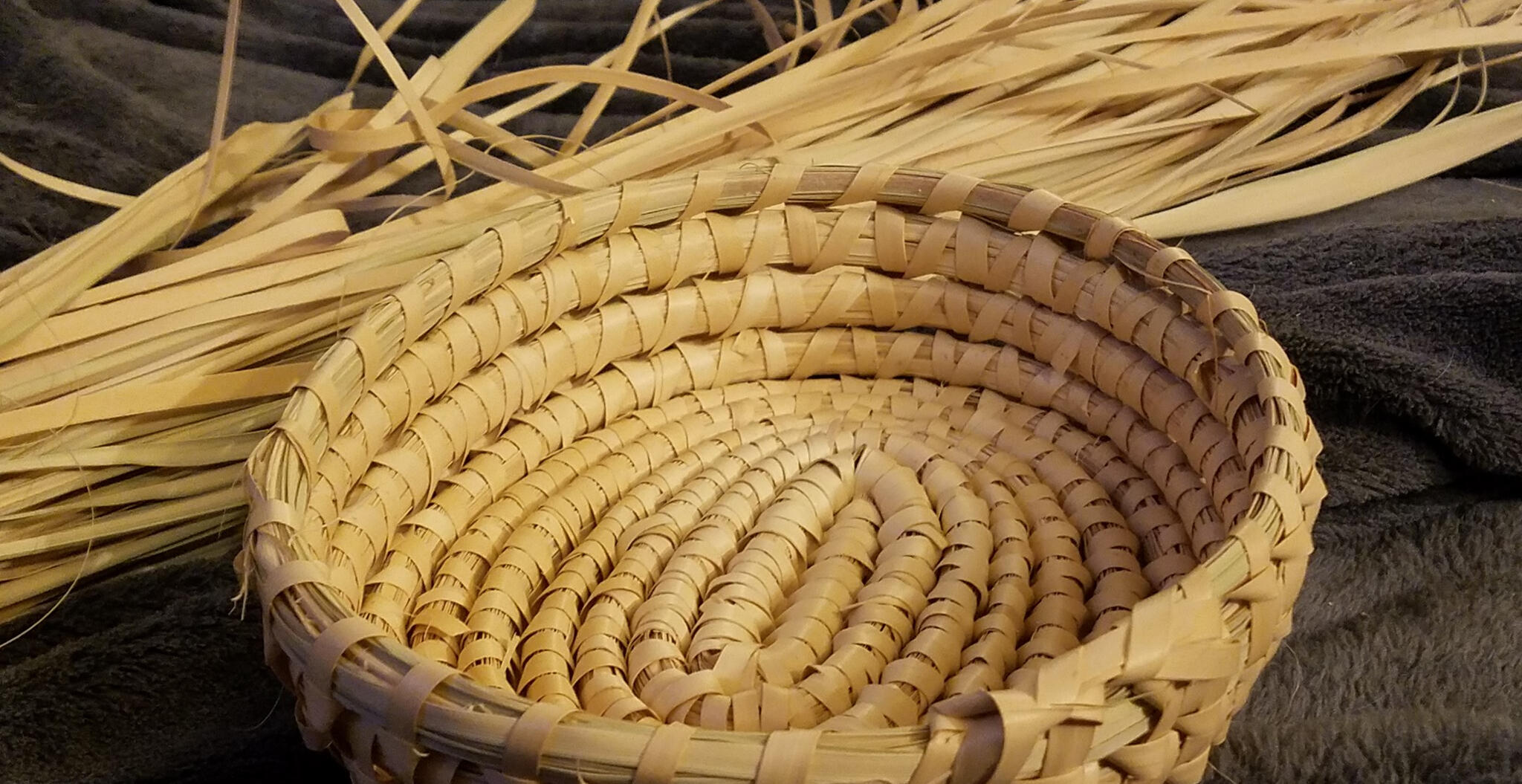 A palmetto basket in the Houma half-hitch style.